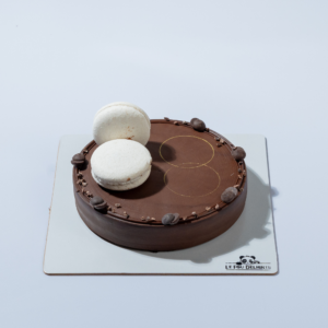Close-up of Belgian Chocolate Royale Cake with smooth chocolate ganache