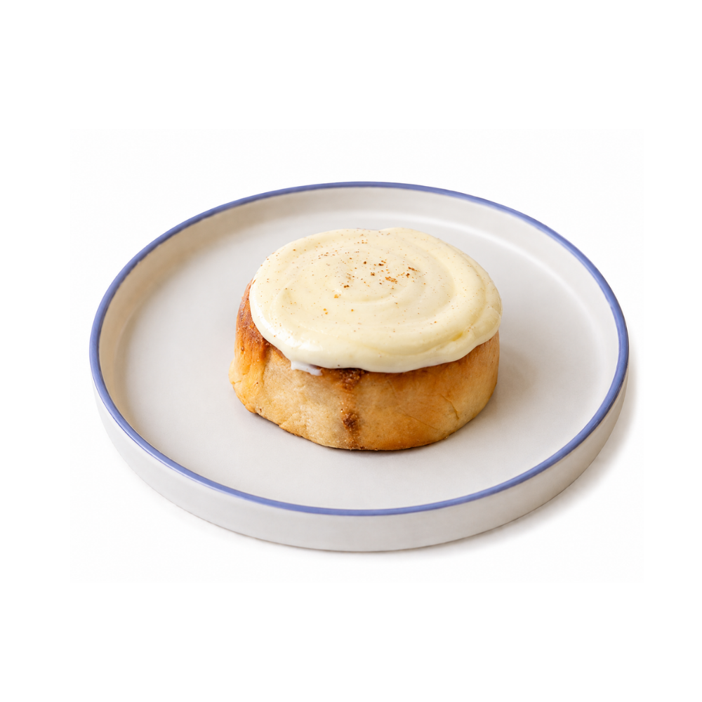 Cinnamon Roll with Glaze (4) Eggless glazed cinnamon roll swirled with aromatic cinnamon spice by Le Fou Delight Vadodara