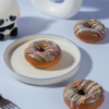 Milk Chocolate Donut Milk chocolate glazed donut from Le Fou Delight bakery, Vadodara