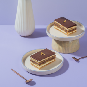 Le Fou Delights French opera pastry slice with layers of almond sponge, chocolate ganache, and coffee buttercream