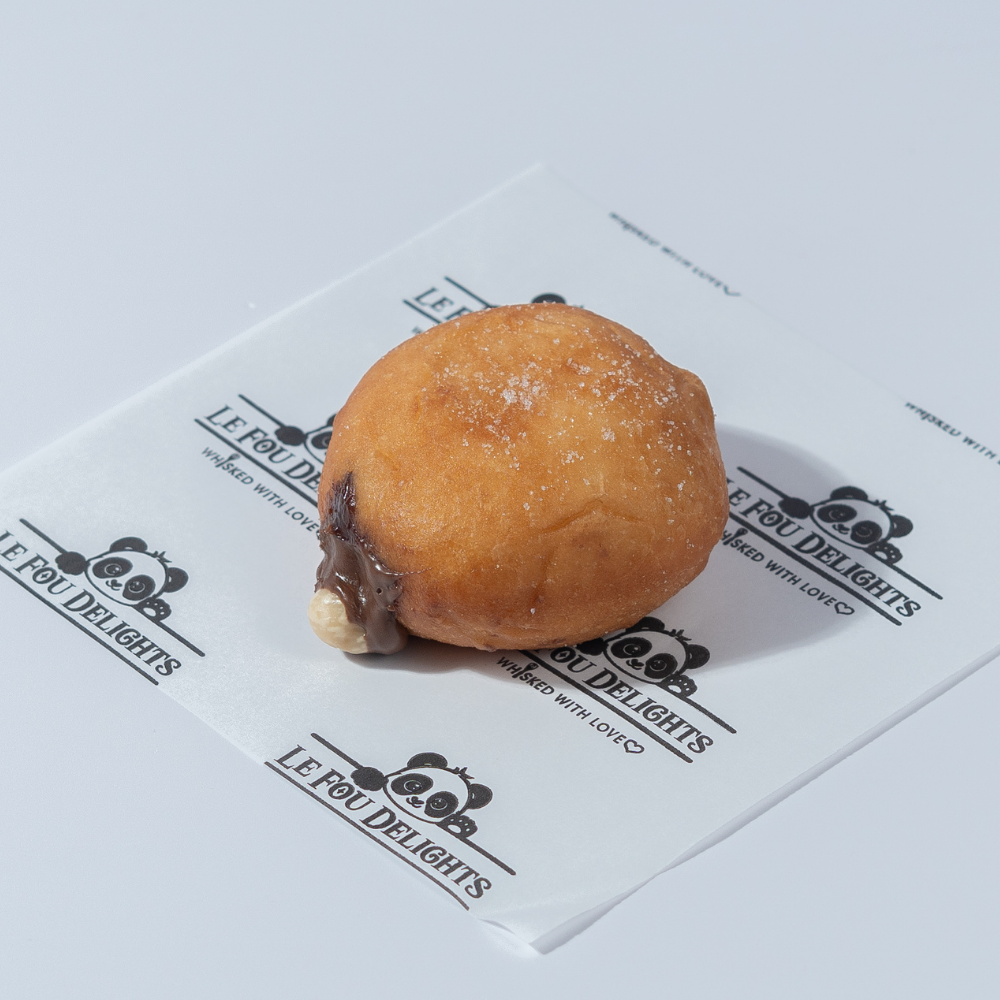 Nutella Bomboloni from Le Fou Delight, Vadodara, filled with creamy Nutella
