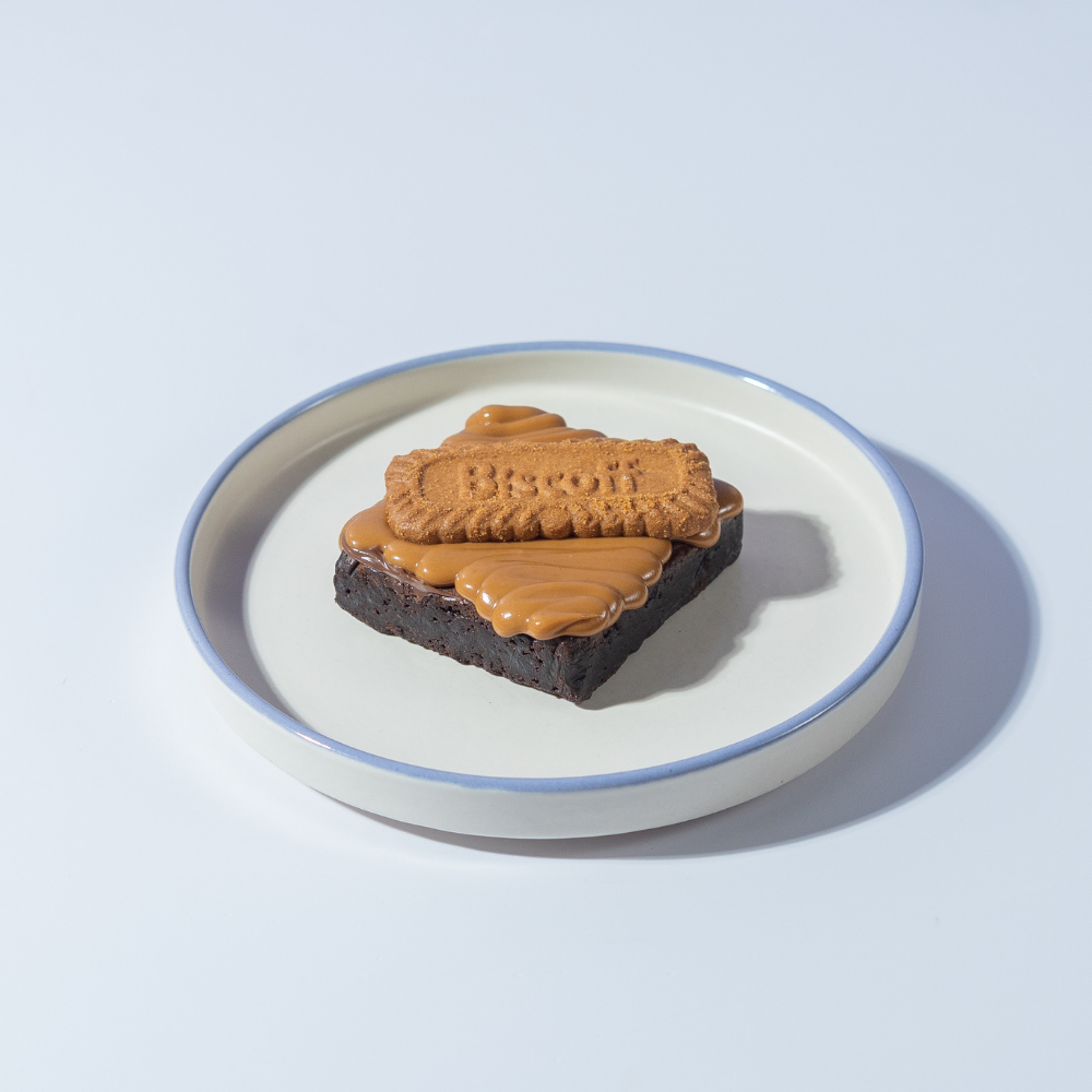 Fudgy chocolate Biscoff brownie topped with creamy Biscoff spread by Le Fou Delight Vadodara