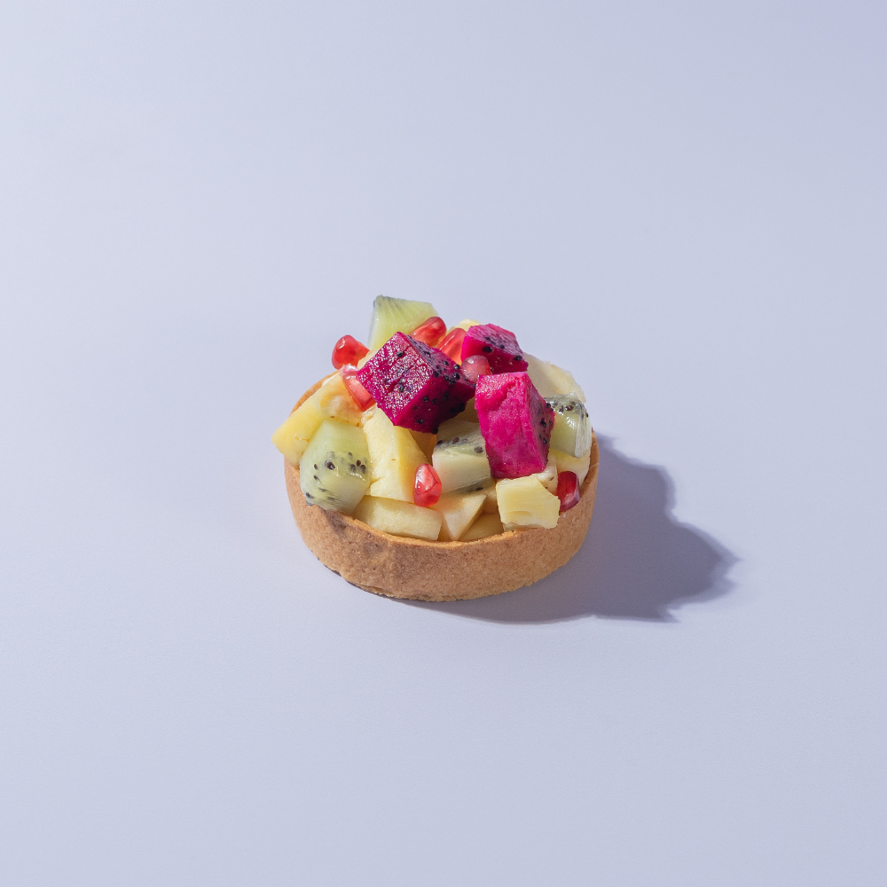 Fresh Fruit Custard Tart (2) Fresh Fruit Custard Tart from Le Fou Delight, Vadodara, topped with seasonal fruits