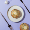 Golden toasted Korean garlic bun stuffed with creamy garlic cream cheese fillingGolden toasted Korean garlic bun stuffed with creamy garlic cream cheese filling