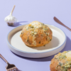 Golden toasted Korean garlic bun stuffed with creamy garlic cream cheese fillingGolden toasted Korean garlic bun stuffed with creamy garlic cream cheese filling