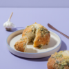 Golden toasted Korean garlic bun stuffed with creamy garlic cream cheese fillingGolden toasted Korean garlic bun stuffed with creamy garlic cream cheese filling