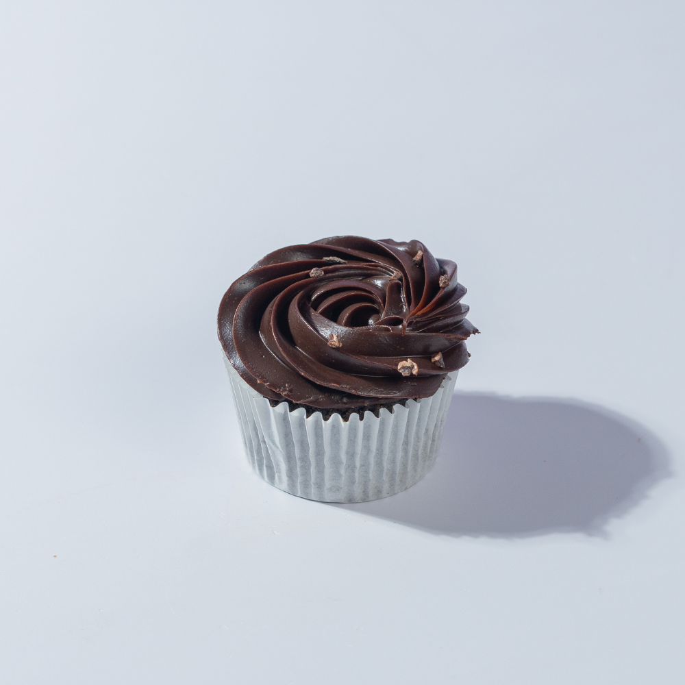 Decadent eggless chocolate cupcake topped with smooth Belgian chocolate ganache frosting