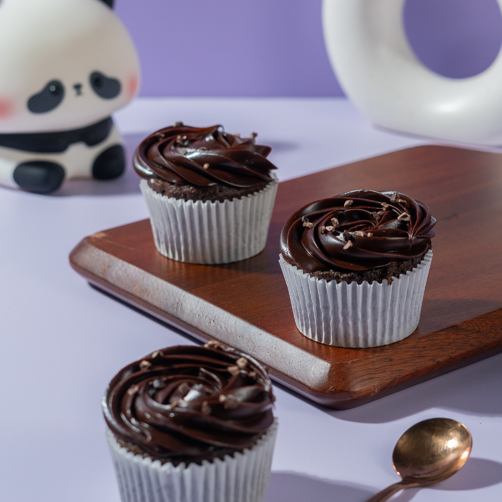 Decadent eggless chocolate cupcake topped with smooth Belgian chocolate ganache frosting