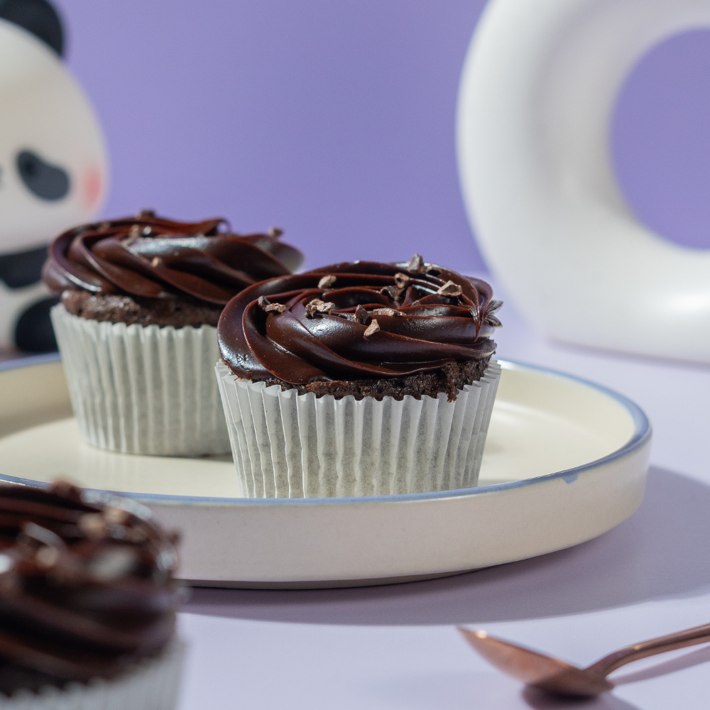 Decadent eggless chocolate cupcake topped with smooth Belgian chocolate ganache frosting