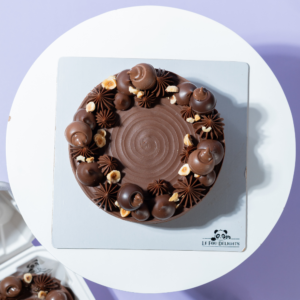 Nutella Hazelnut Cake slice with truffle ganache and roasted hazelnuts, Le Fou Delight, Vadodara