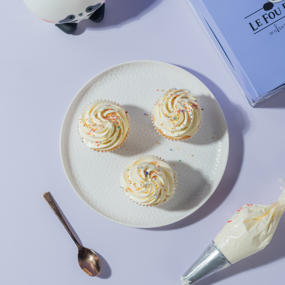 Vanilla Bean Buttercream Cupcake Classic eggless vanilla cupcake topped with rich, real vanilla bean buttercream swirl