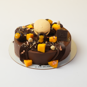 Belgian chocolate mango cake Vadodara premium eggless dessert