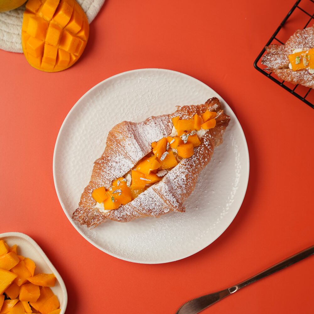 Mango croissant Vadodara fresh flaky eggless pastry