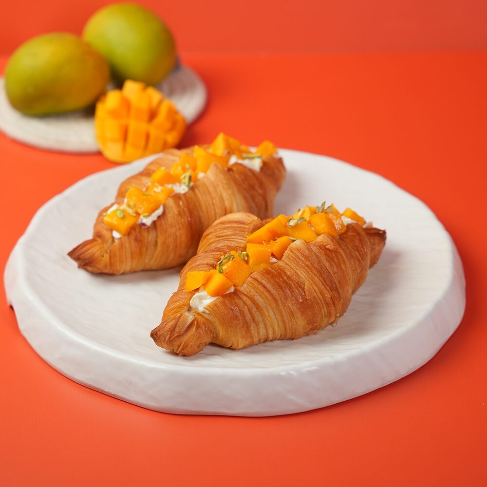 Premium mango croissant Baroda bakery buttery layers