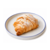 Golden toasted almond croissant sliced open to reveal smooth frangipane filling