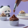 Almond Milk Chocolate Cupcake (3) Almond Milk Chocolate Cupcake in Vadodara topped with milk chocolate ganache, roasted almonds, and filled with almond praline by Le Fou Delight