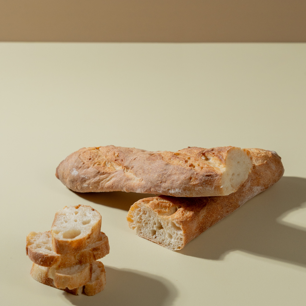 Baguettes (2) Fresh artisan French baguette with a crisp golden crust from Le Fou Delight in Vadodara