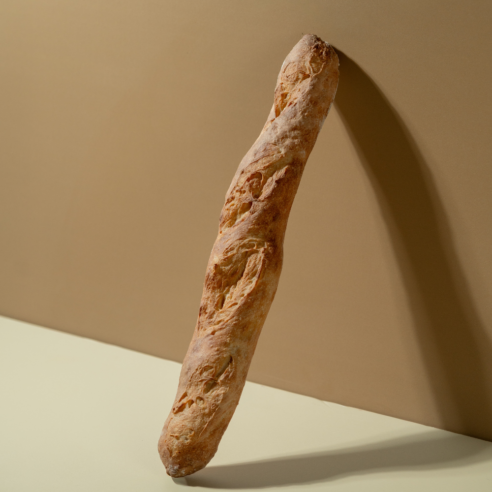 Baguettes Fresh artisan French baguette with a crisp golden crust from Le Fou Delight in Vadodara
