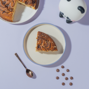Rich eggless butter teacake loaf loaded with Nutella swirls and chocolate chips