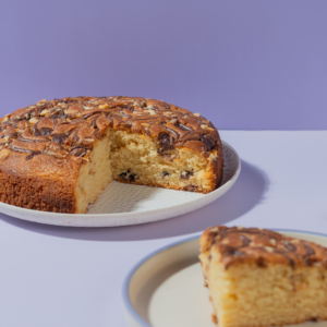 Rich eggless butter teacake loaf loaded with Nutella swirls and chocolate chips