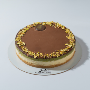 Chocolate Kunafa Pistachio Cheesecake topped with crispy kunafa and pistachios by Le Fou Delight Vadodara