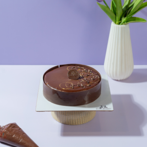 Chocolate Merveilleux Entremet in Vadodara with crisp meringue and airy chocolate mousse by Le Fou Delight