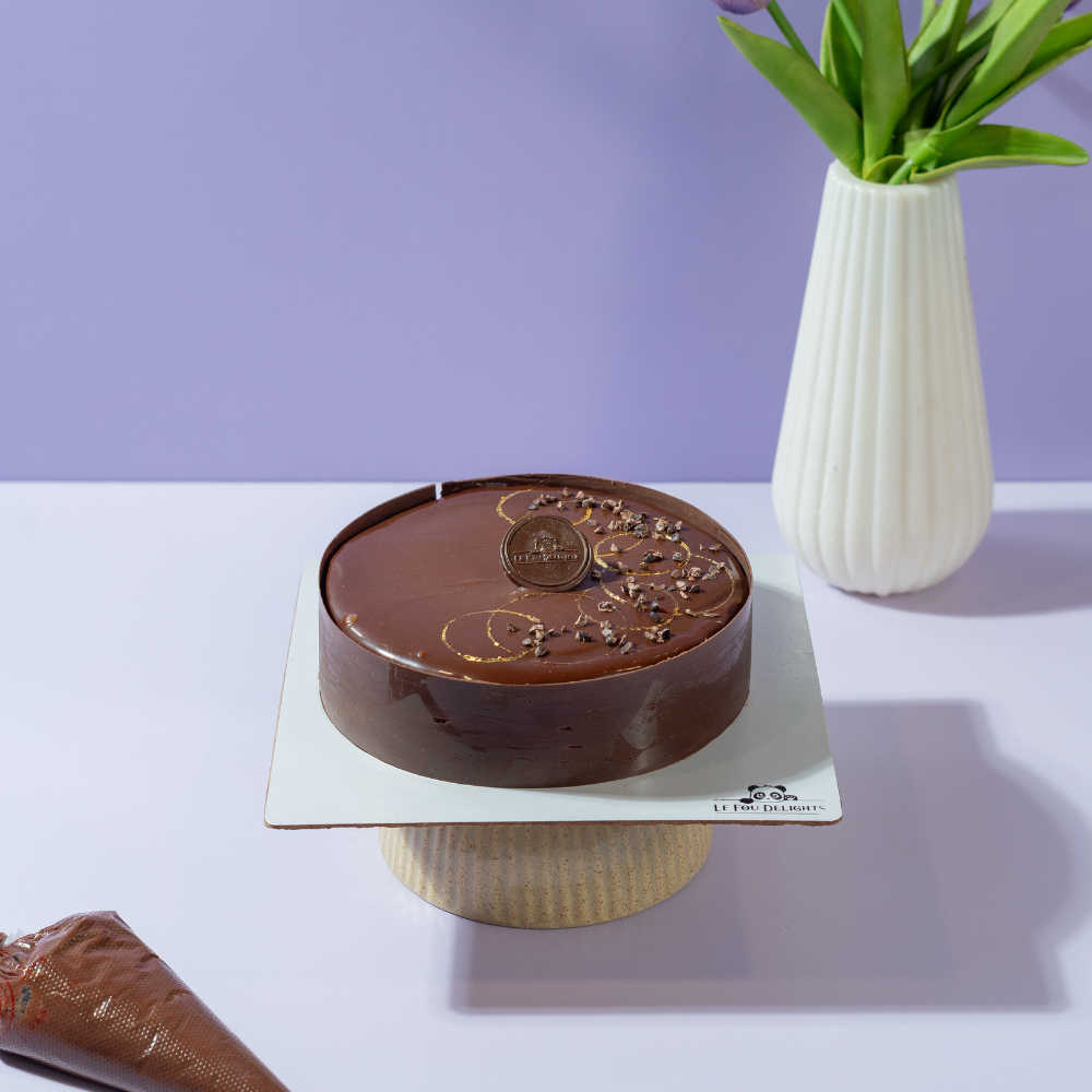 Chocolate Merveilleux Entremet in Vadodara with crisp meringue and airy chocolate mousse by Le Fou Delight