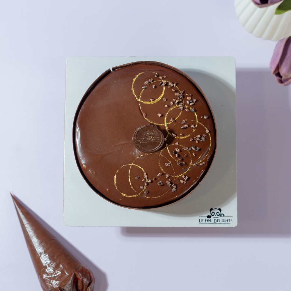 Chocolate Merveilleux Entremet in Vadodara with crisp meringue and airy chocolate mousse by Le Fou Delight