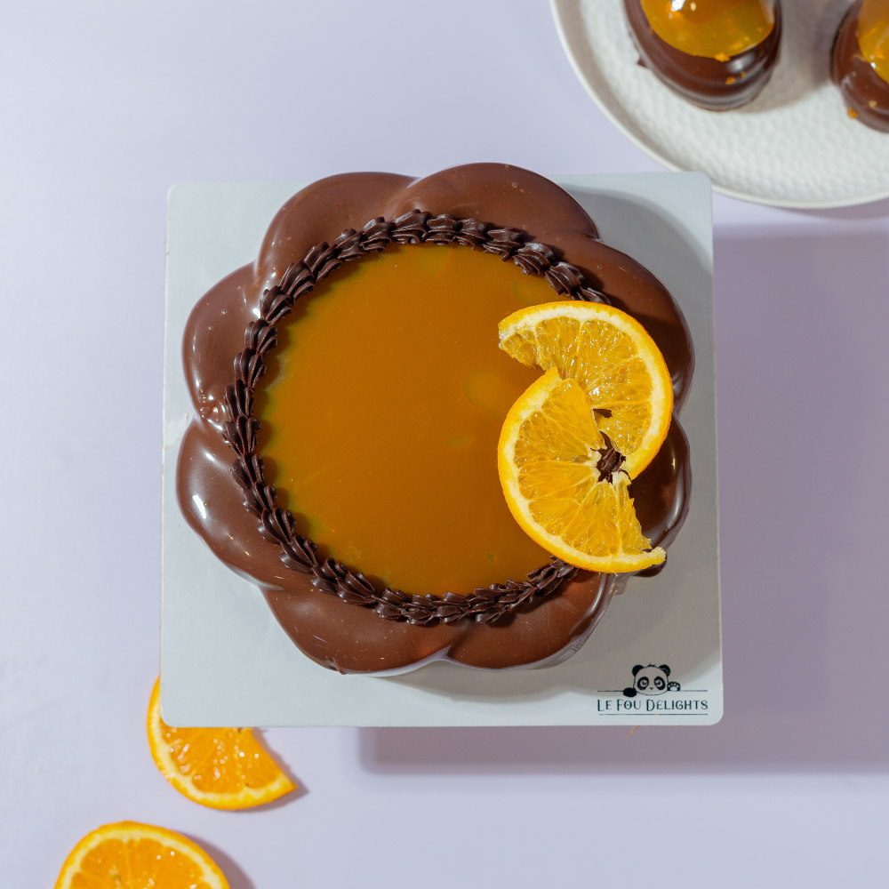 Freshly prepared eggless chocolate orange entremet ready for delivery in Vadodara