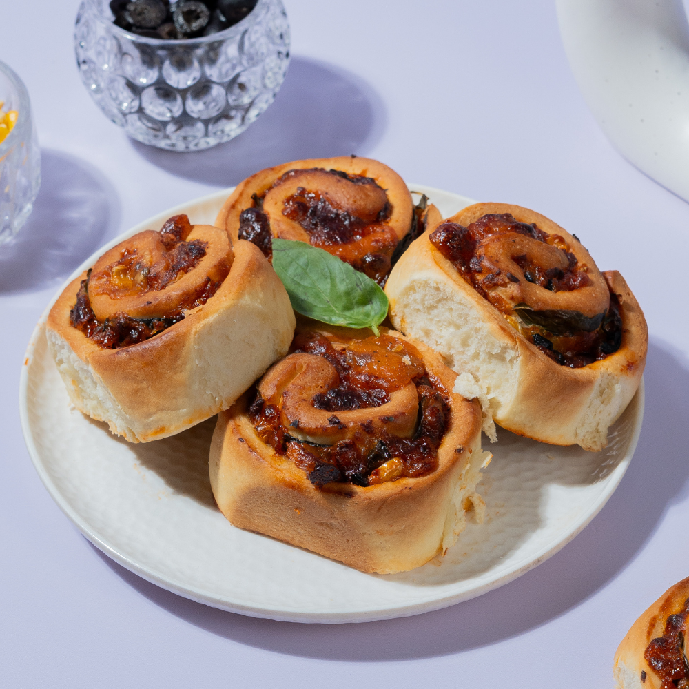Fresh Corn & Olives Roll with buttery puff pastry baked by Le Fou Delight in Vadodara