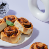 Fresh Corn & Olives Roll with buttery puff pastry baked by Le Fou Delight in Vadodara