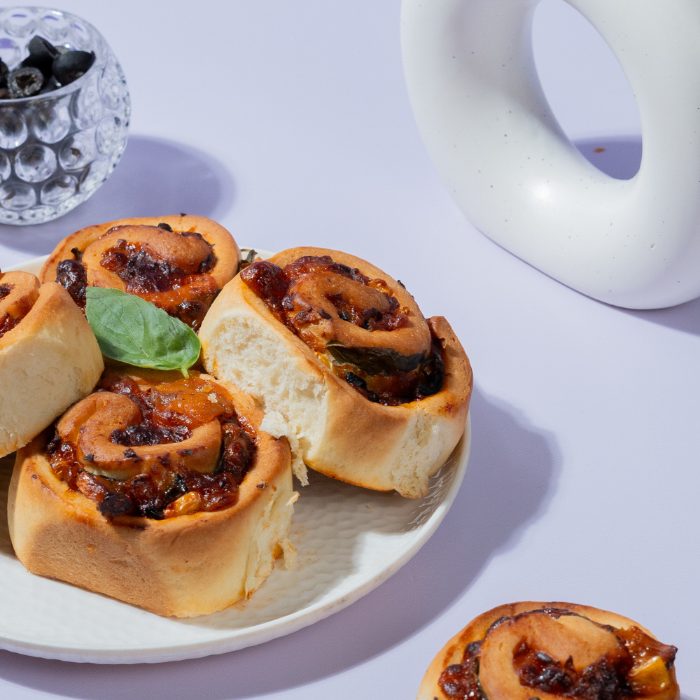 Fresh Corn & Olives Roll with buttery puff pastry baked by Le Fou Delight in Vadodara