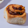 Fresh Corn & Olives Roll with buttery puff pastry baked by Le Fou Delight in Vadodara