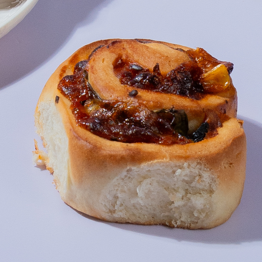 Fresh Corn & Olives Roll with buttery puff pastry baked by Le Fou Delight in Vadodara