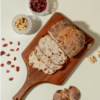 Freshly baked artisan cranberry and walnut sourdough bread loaf with crisp golden crust by Le Fou Delight Vadodara
