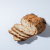 Freshly baked artisan cranberry and walnut sourdough bread loaf with crisp golden crust by Le Fou Delight Vadodara