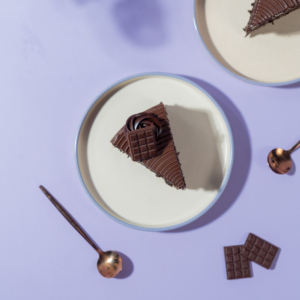 Soft chocolate sponge layered with creamy chocolate fudge pastry