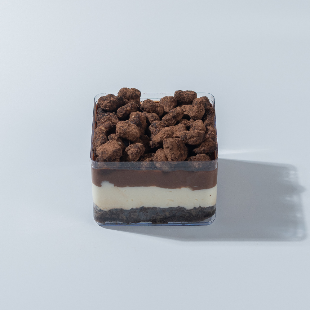 Decadent eggless chocolate lazy cat cake tub layered with ganache and cream cheese frosting