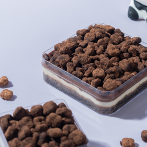 Decadent eggless chocolate lazy cat cake tub layered with ganache and cream cheese frosting