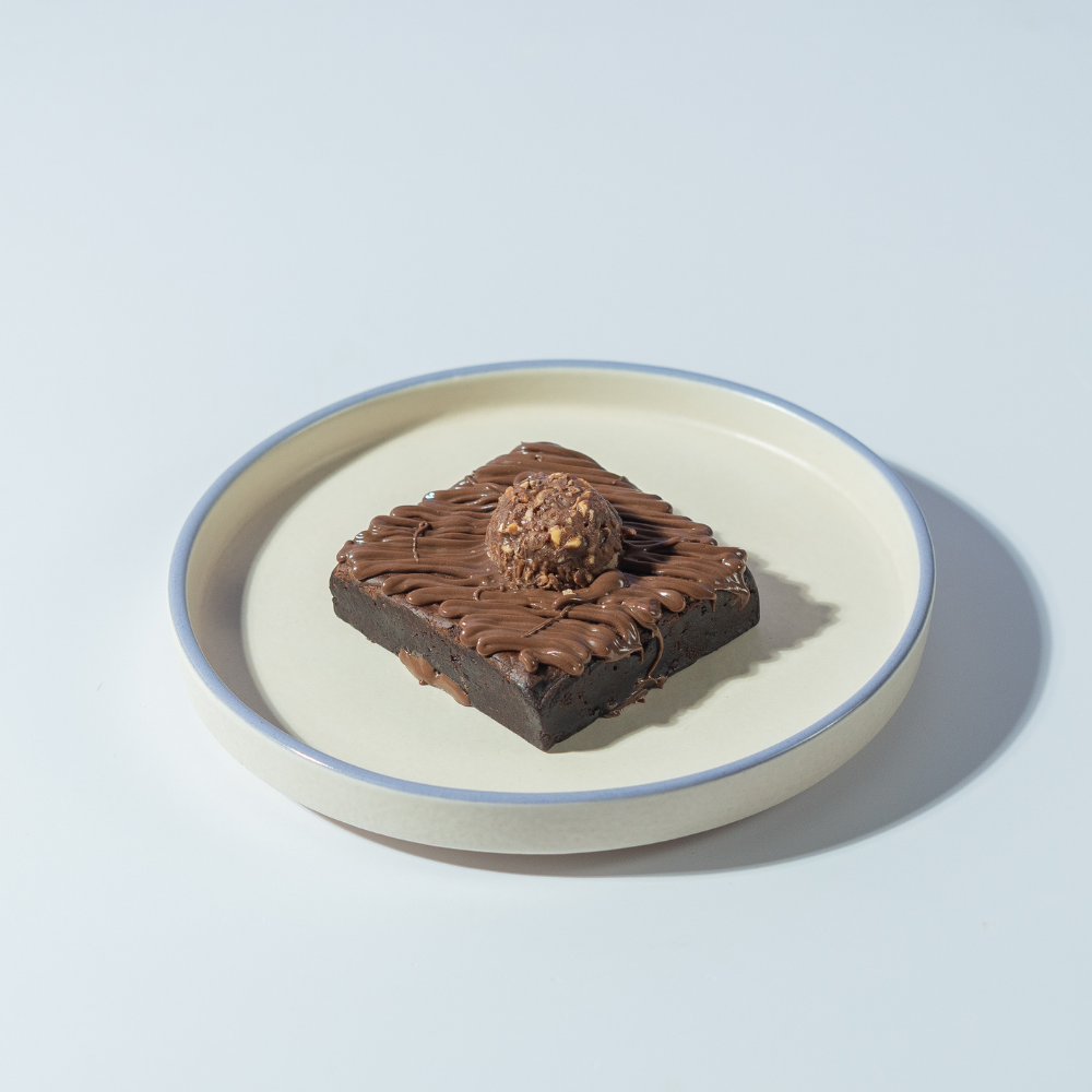 Chocolate Fudgy Brownie in Vadodara by Le Fou Delight with a rich fudgy center, crackly top, and premium chocolate, baked fresh daily.
