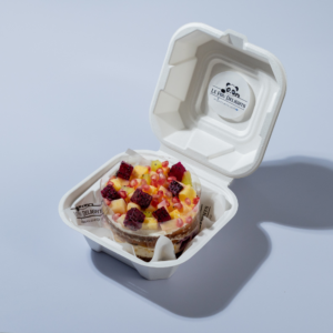 Eggless fresh fruit gateaux cake topped with vibrant seasonal fruits by Le Fou Delight Vadodara