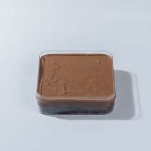 Hazelnut Matilda Cake Tub in Vadodara with layers of chocolate sponge, hazelnut cream, chocolate ganache, and Rocher glaze by Le Fou Delight