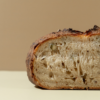 Fresh Multigrain Sourdough loaf with wholesome grains and seeds by Le Fou Delight in Vadodara