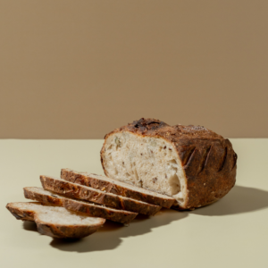 Fresh Multigrain Sourdough loaf with wholesome grains and seeds by Le Fou Delight in Vadodara