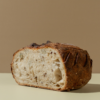 Fresh Multigrain Sourdough loaf with wholesome grains and seeds by Le Fou Delight in Vadodara