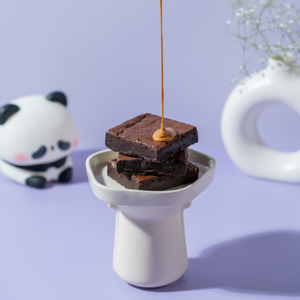 Nutella Brownie in Vadodara by Le Fou Delight featuring a rich fudgy brownie topped with creamy Nutella, freshly baked and handcrafted daily.