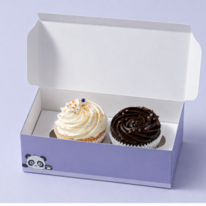 Pack of 2 cupcakes in Vadodara by Le Fou Delights featuring vanilla and chocolate cupcakes with creamy frosting and colourful sprinkles.