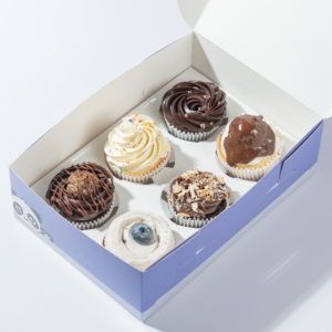 Pack of 6 cupcakes in Vadodara by Le Fou Delight with assorted flavours, creamy frosting, chocolate toppings, nuts, and fresh fruit.