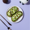 Freshly prepared healthy pesto avocado sourdough toast ready for delivery in Vadodara