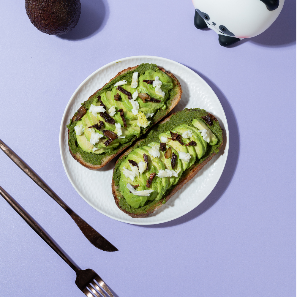 Freshly prepared healthy pesto avocado sourdough toast ready for delivery in Vadodara